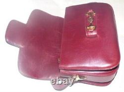 Gucci, burgundy leather, vtg 1955 Horsebit shoulder bag w gold horsebit accents
