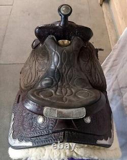 Hereford/Textan 15 Vintage, Tooled with silver & breastplate. Great saddle