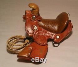 TOOLED LEATHER vtg tiny saddle childs doll toy miniature small horse western art
