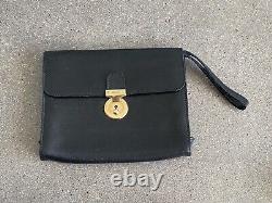 VNTG Salvatore Ferragamo black clutch / wristlet purse with horse print interior