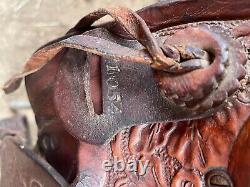 Vintage BigHorn Saddle 16in Beautiful Tooled leather with horse head design WOW