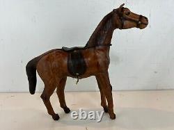 Vintage Leather Wrapped Horse Wearing Saddle Figurine