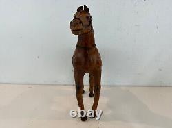 Vintage Leather Wrapped Horse Wearing Saddle Figurine