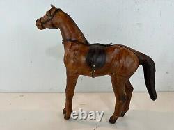 Vintage Leather Wrapped Horse Wearing Saddle Figurine