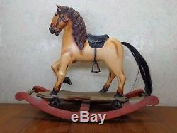 Vintage Wooden Rocking Horse Carved Leather Saddle Cast Iron Wheels Glass Eyes