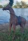 Vintage leather horse statue with saddle