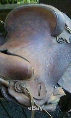 Vintage tooled leather horse saddle